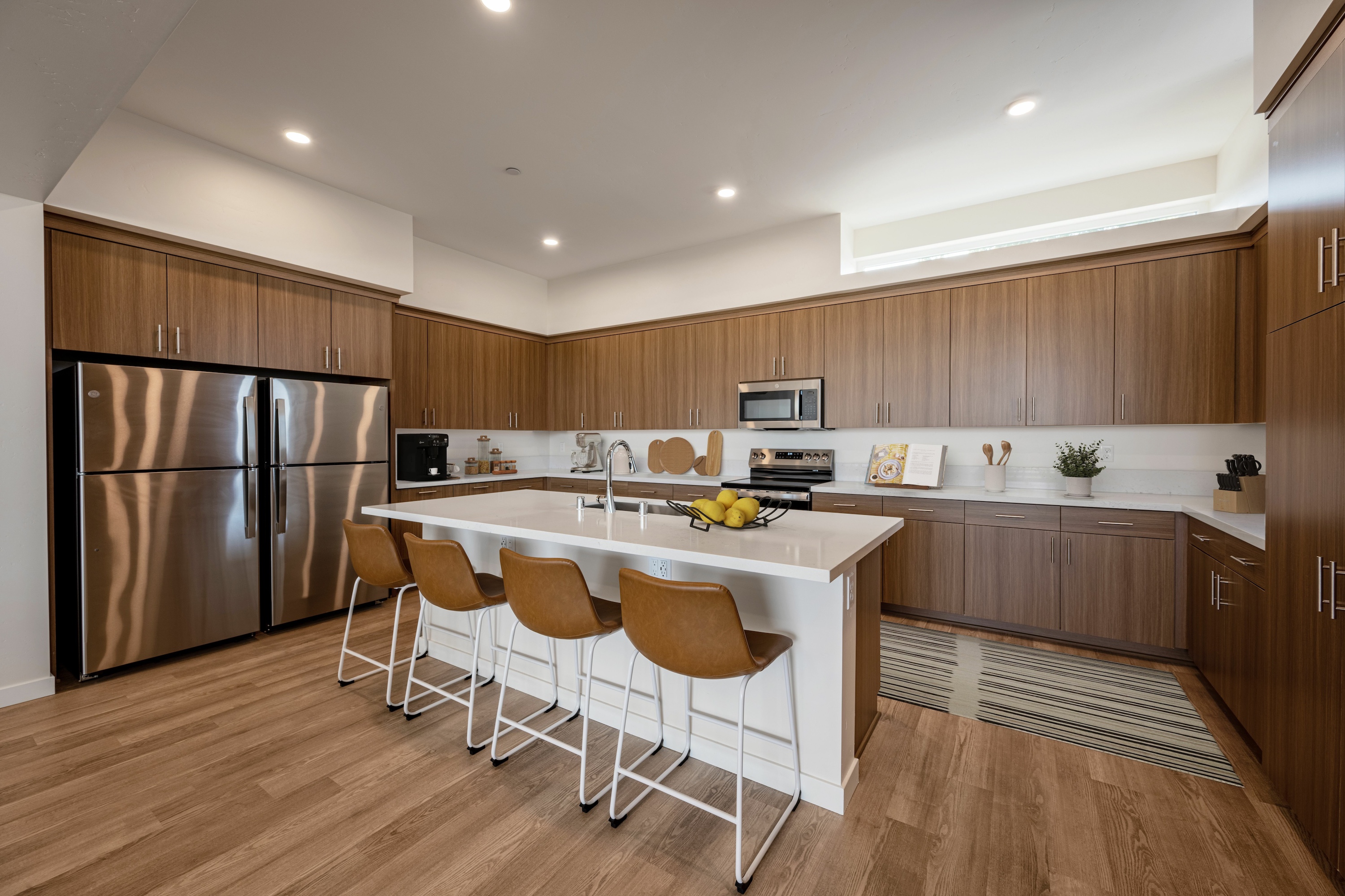 Luxury kitchen with island and double stainless-steel fridges